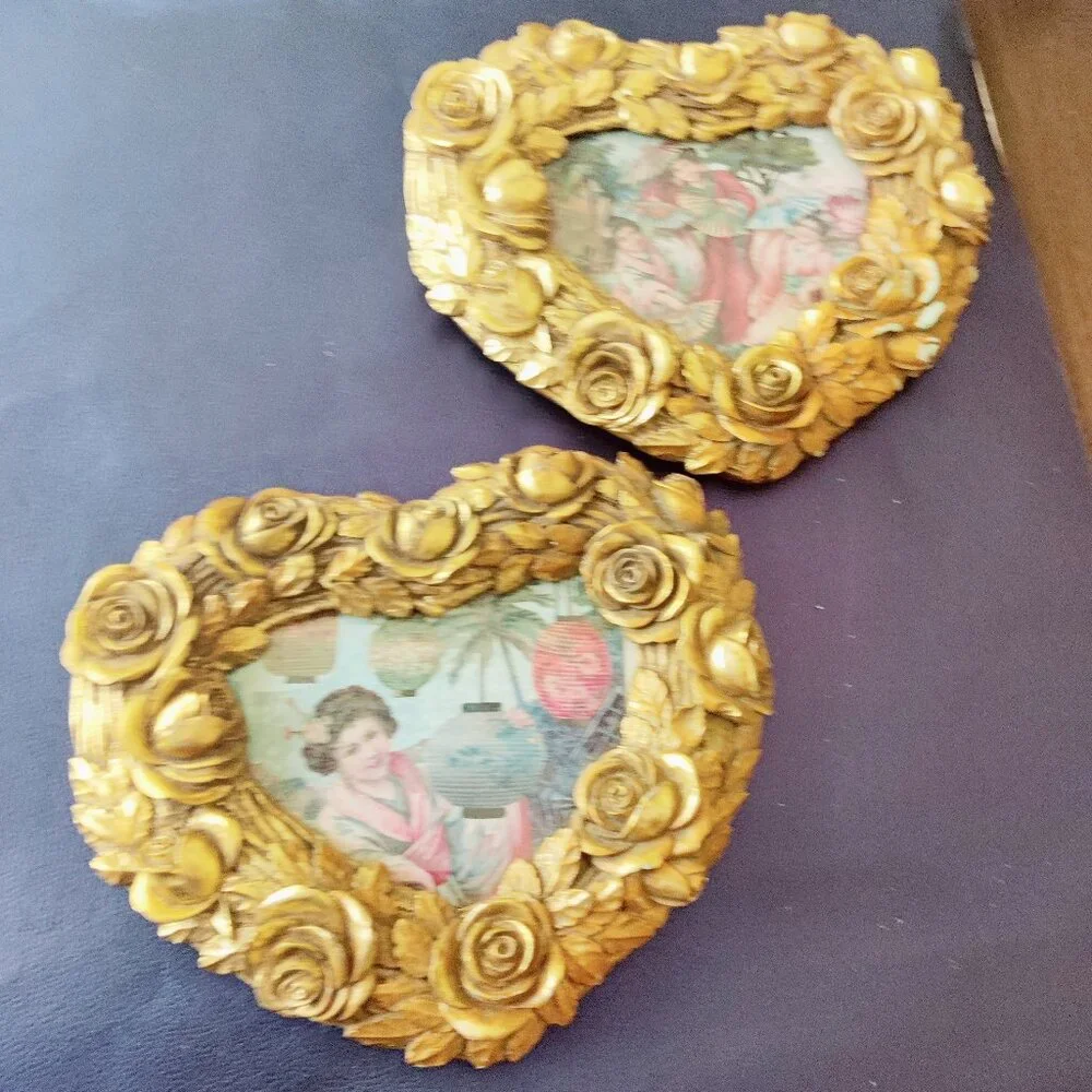 Picture Frames from Nordstroms a heavy gold heart frame with Roses & Leaf Border